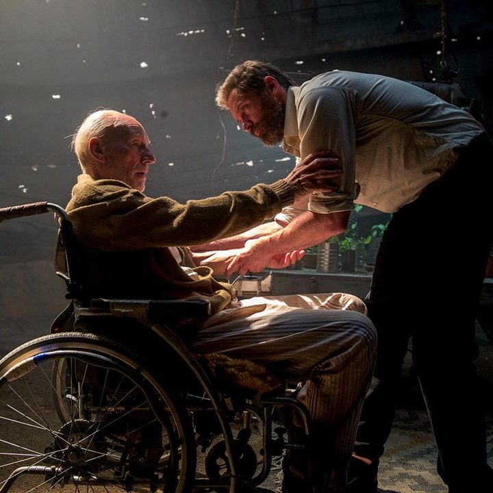 Logan and Charles Xavier grab ahold of each other in Logan (2017).
