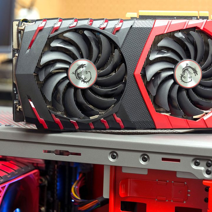 An MSI Radeon RX 580 Gaming X+ 8G graphics card on a table.