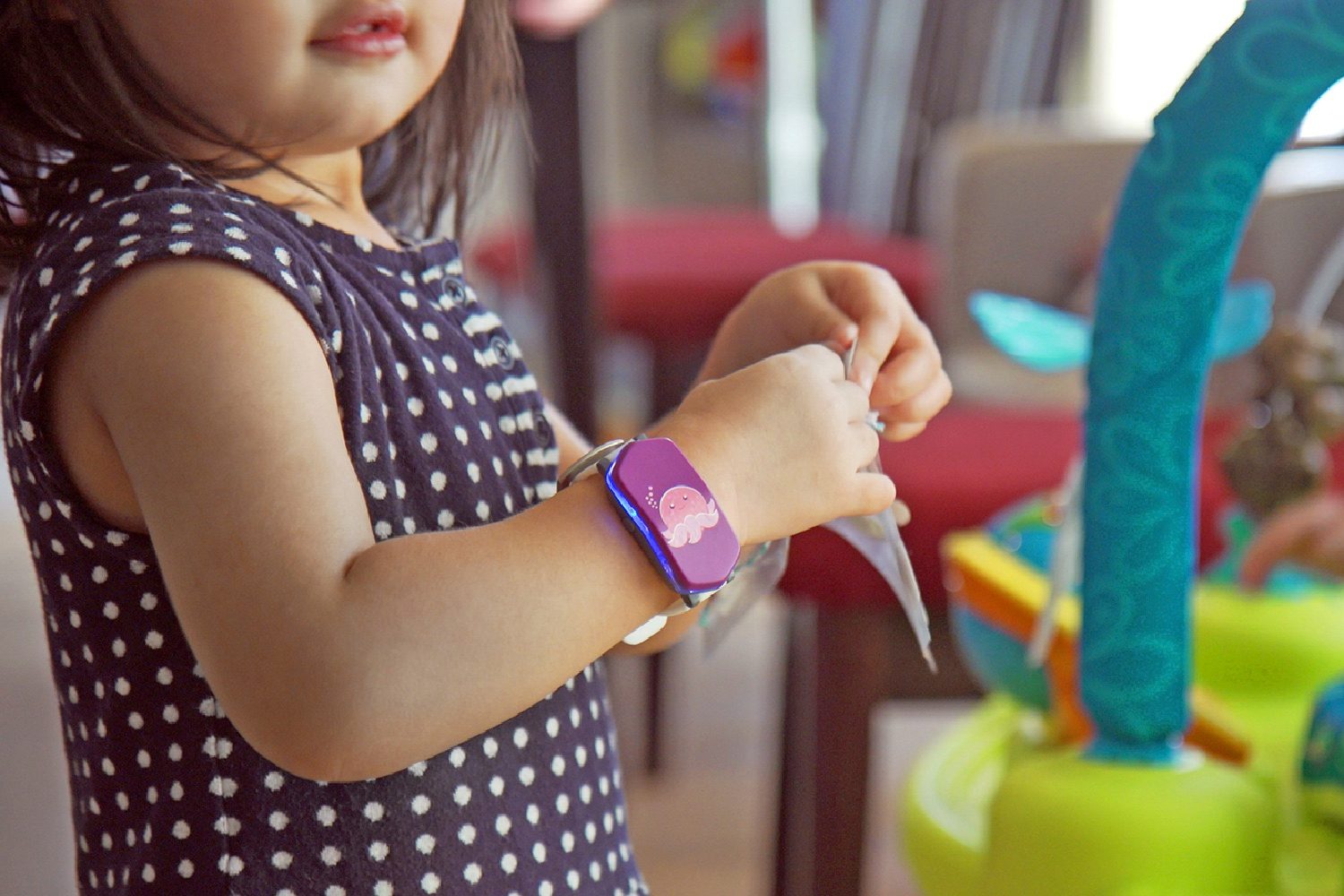 quantified kid wearable tech girl with kiddo  indoors 5