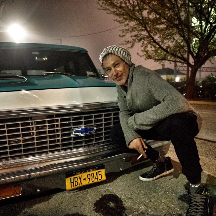 Matisyahu posing with car