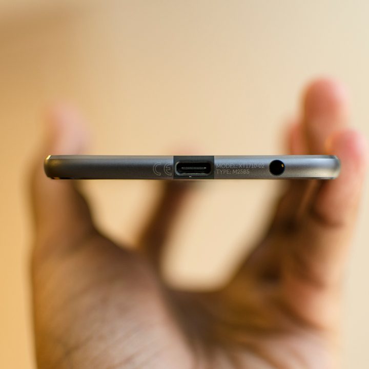 Moto Z2 Play in hand bottom view