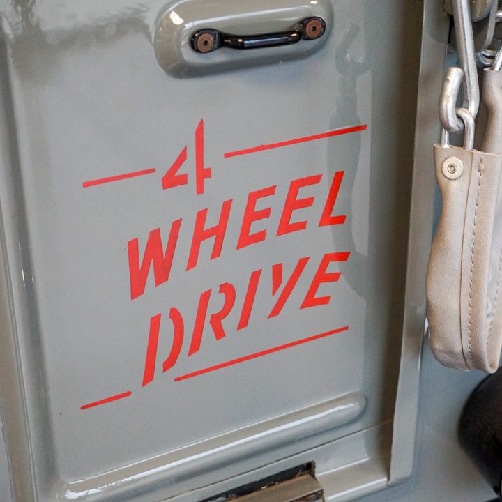 Decal on the side of a older/retro jeep at the Omix-ADA Jeep Collection