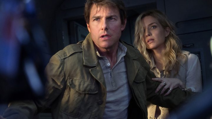 Tom Cruise and Annabelle Wallis stare at something malevolent in a still from the 2017 movie The Mummy