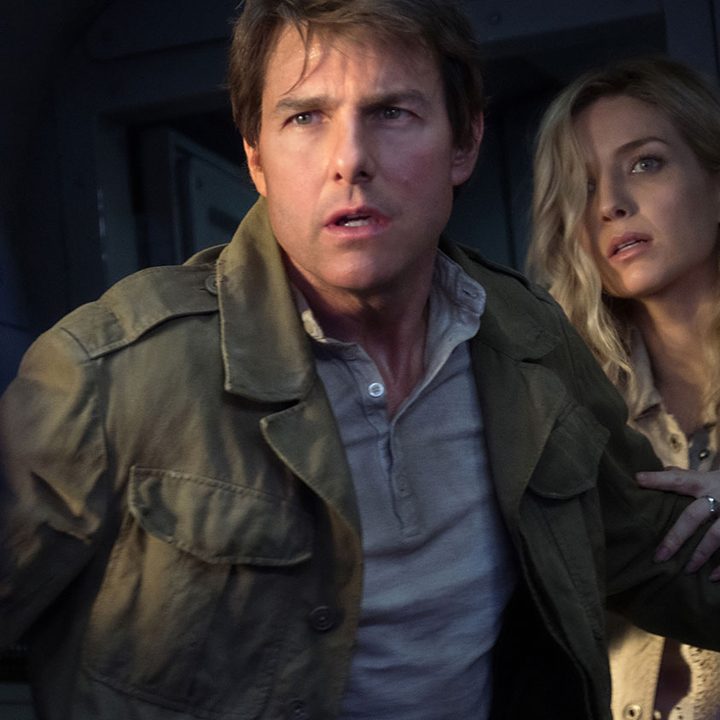 Tom Cruise and Annabelle Wallis stare at something malevolent in a still from the 2017 movie The Mummy