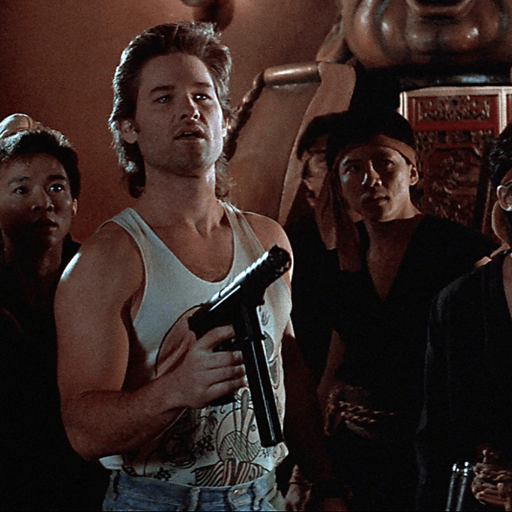 Man points his gun in Big Trouble in Little China.