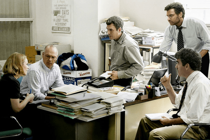 The cast of Spotlight in the newsroom.