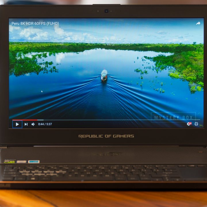 Asus ROG Zephyrus shot of video playing in HD on youtube and front of laptop