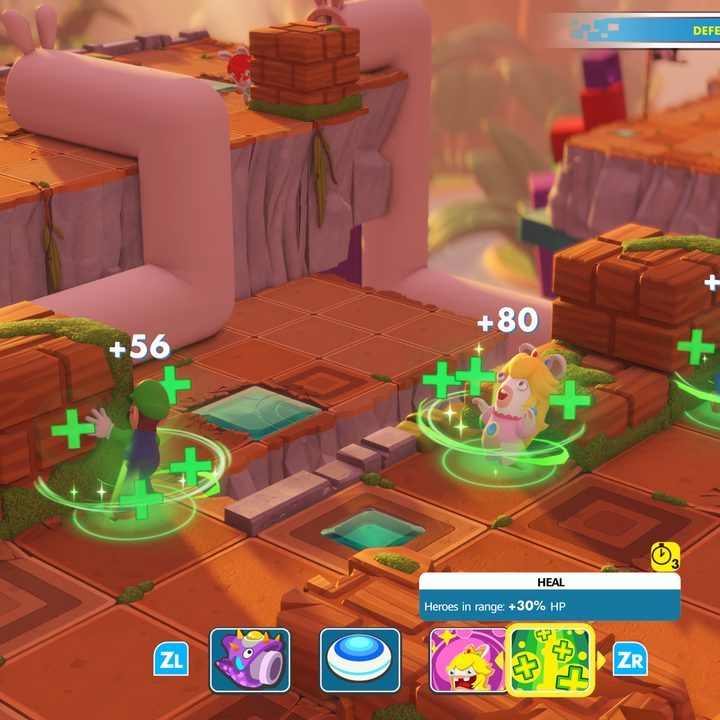 Rabbid Peach healing Mario and Luigi in combat — Mario + Rabbids Kingdom Battle
