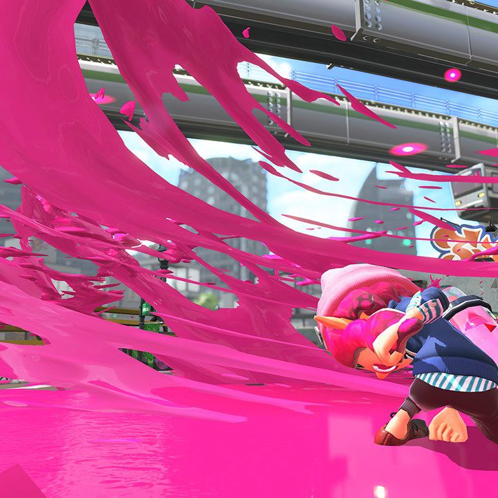 Splatoon 2 review character slamming onto the ground and generating a blast of paint