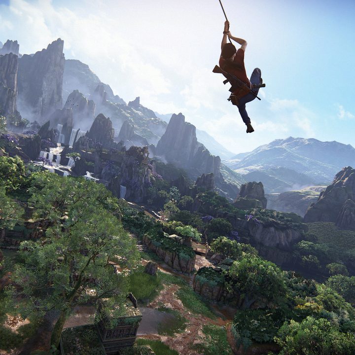 Uncharted: The Lost Legacy Chloe swinging on a rope over a large cliff