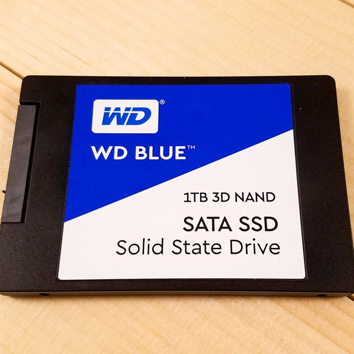 WD Blue 3D NAND SATA SSD sitting flat on a table