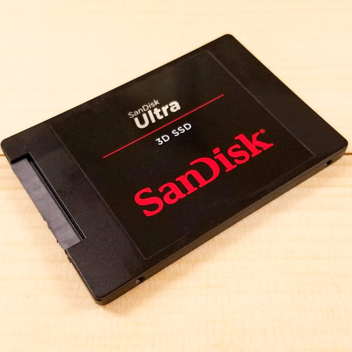 SanDisk Ultra 3D SSD sitting flat on a table angled at 45 degrees