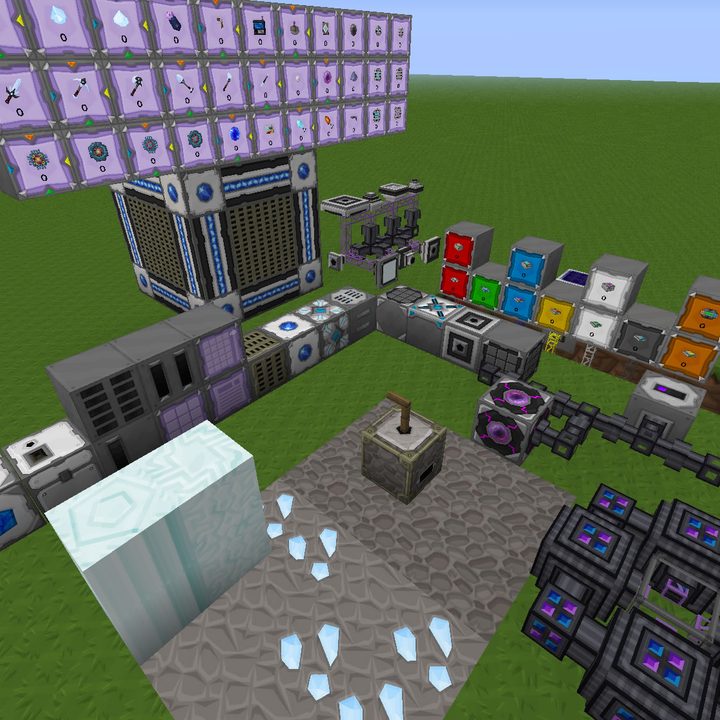 A giant minecraft computer in an open field.