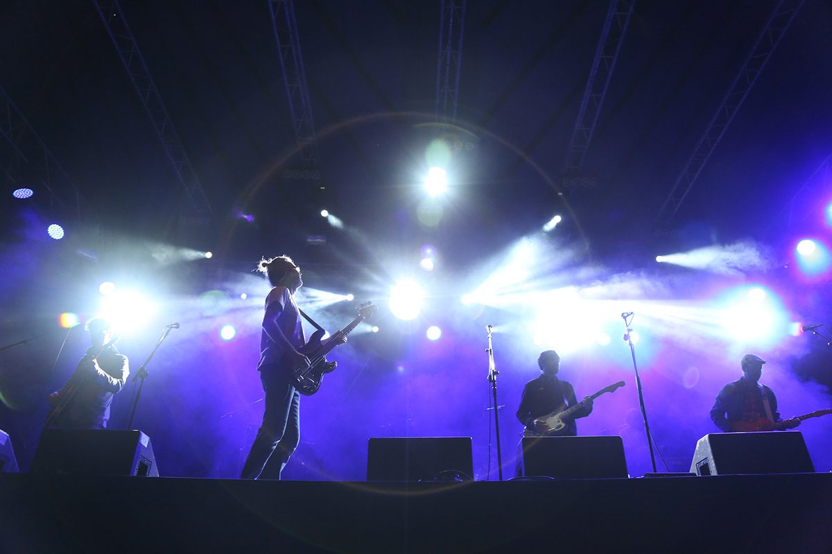 Broken Social Scene silhouettes on stage