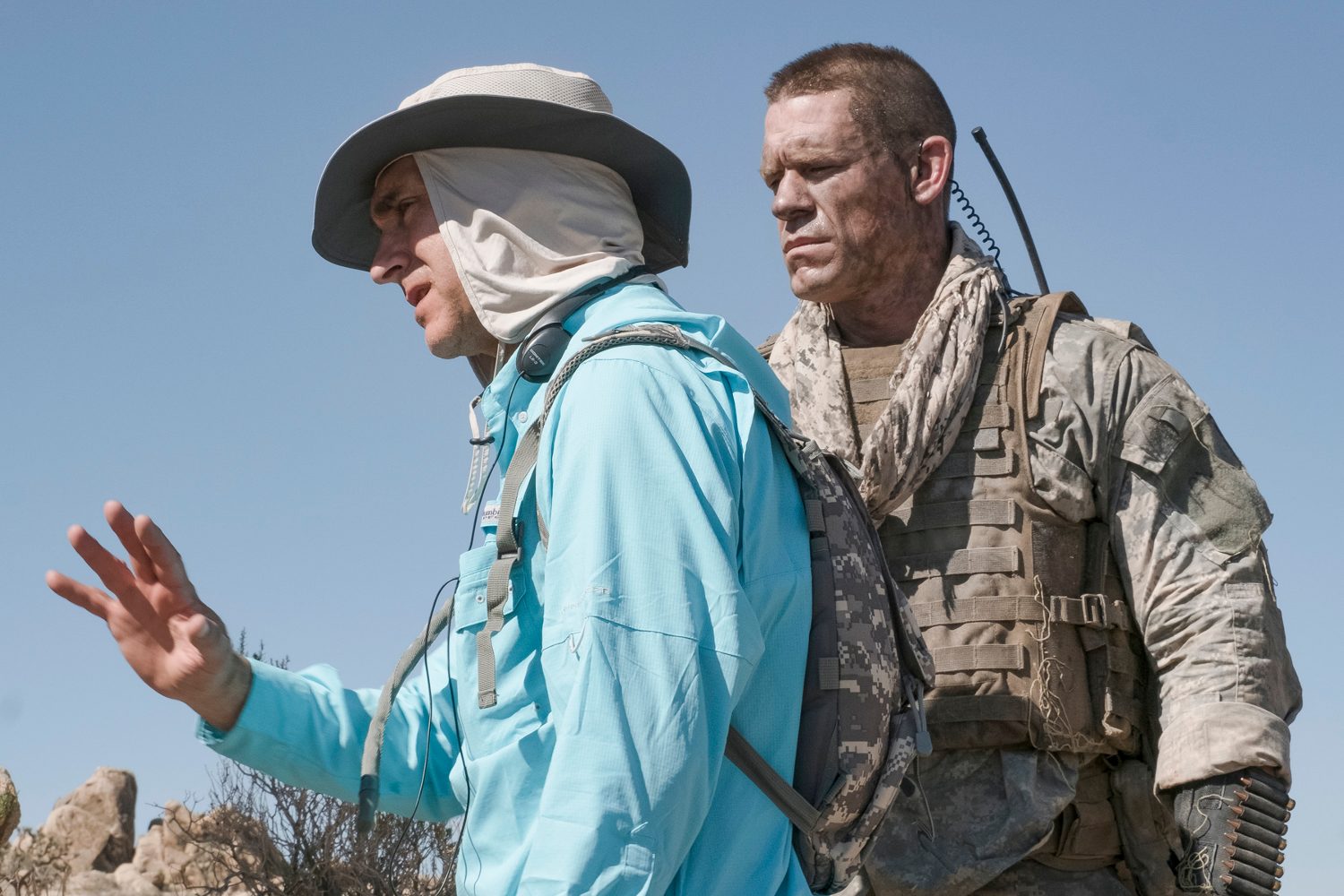 Doug Liman talking to John Cena on the set of The Wall