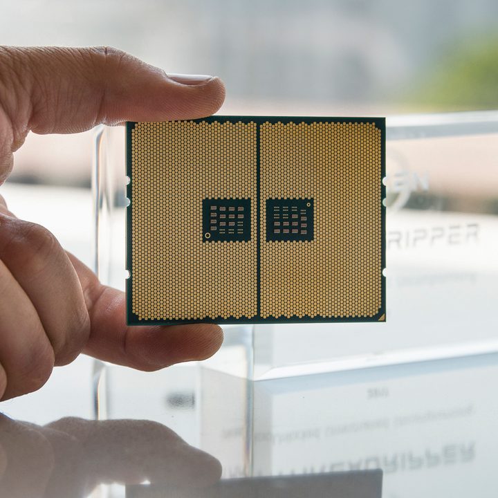 A person holding the AMD Ryzen Threadripper 1950X.