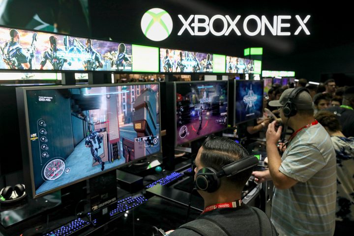 Mike Ybarra interview — Gamers test 'Crackdown' on the XBox One X during the Electronic Entertainment Expo E3 at the Los Angeles Convention Center on June 13, 2017 in Los Angeles, California.