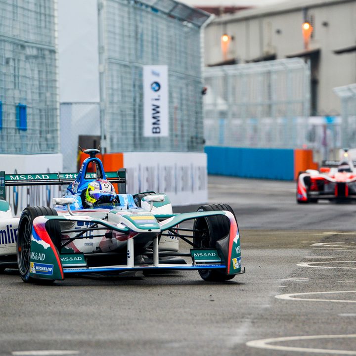 A BMW driver flying down a straightway in the NYC ePrix