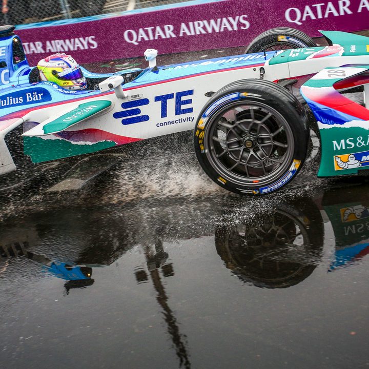 A BMW driver drifting through a puddle in the middle of the NYC ePrix