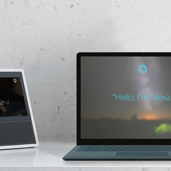 Alexa says hello on a windows PC that's next to a smart speaker with Alexa.