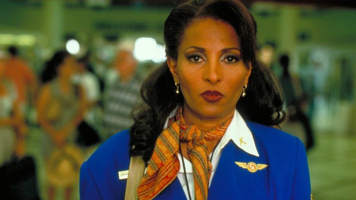 Pam Grier as Jackie Brown walking through an airport in Jackie Brown.