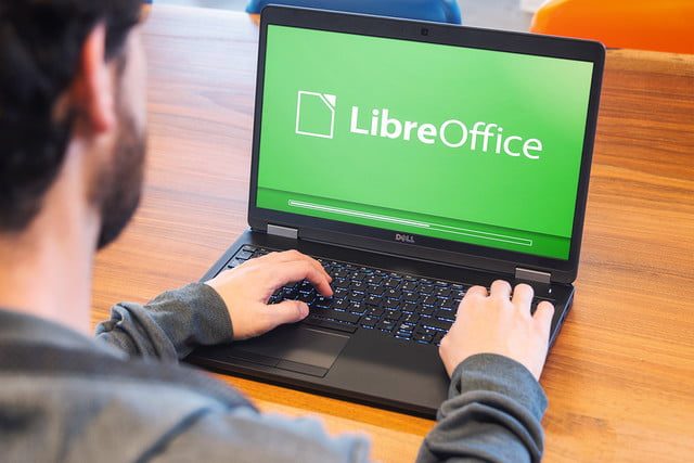 Person using Libreoffice on laptop.