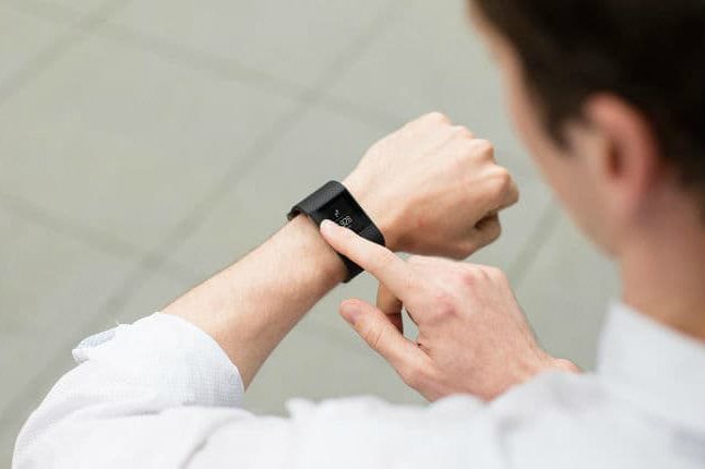 fitbit surge, apple watch