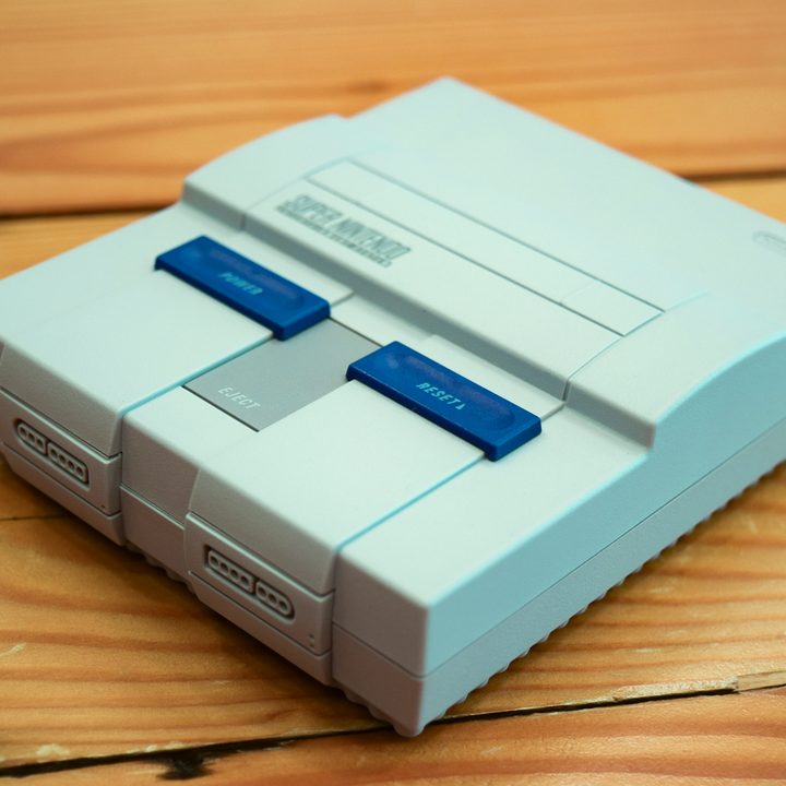 The SNES Classic Edition angled to the downward left