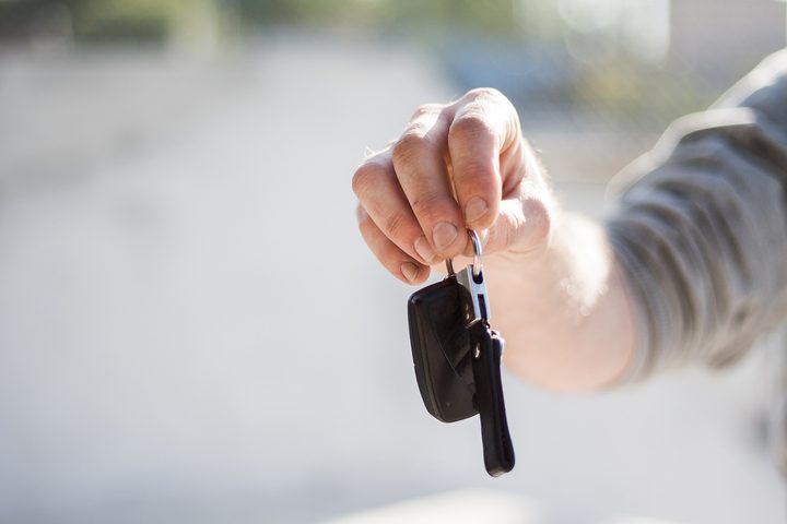 car marketing holding keys