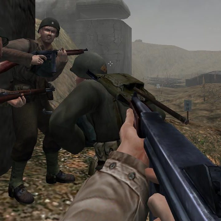 Soldiers taking cover on a battlefield.