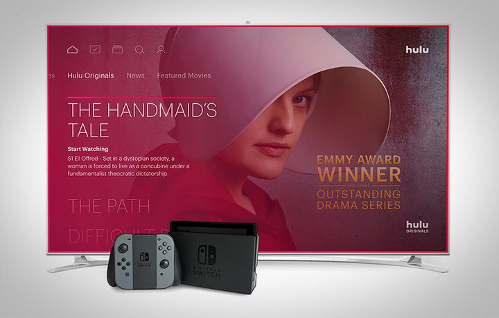 The Hulu app appears on a screen behind the Nintendo Switch