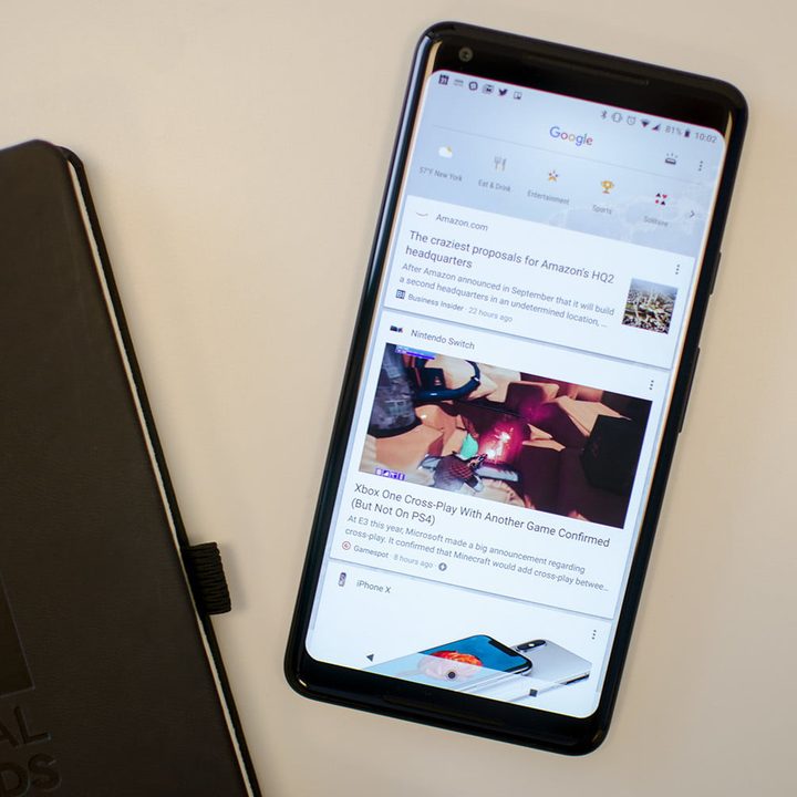 Two cell phones being compared side-by-side.