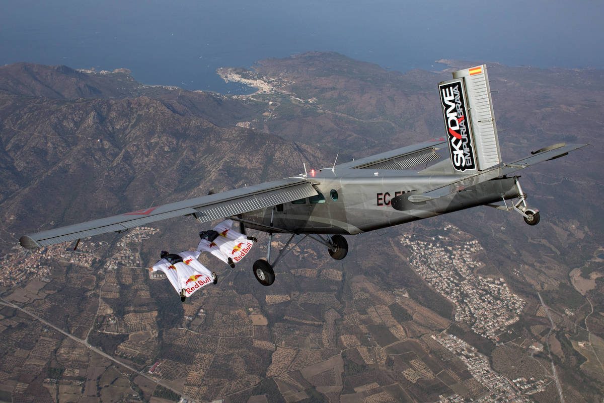 Wingsuits land inside aircraft