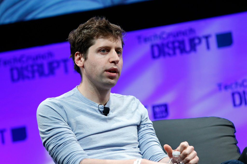 Sam Altman presenting a talk.