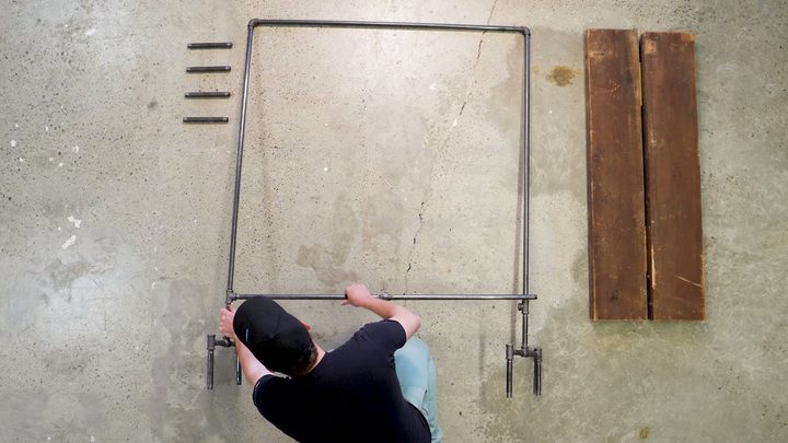 industrial-style clothing rack Attach the legs to the main body