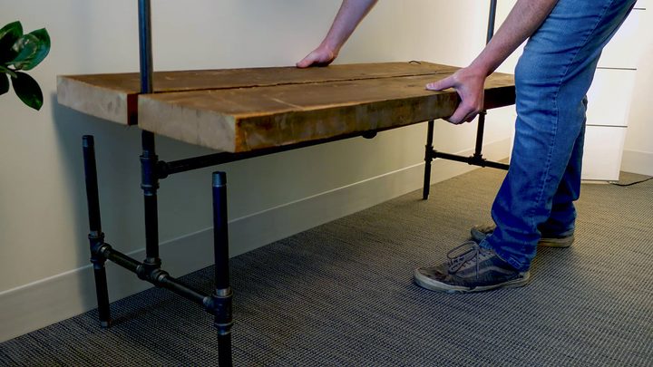 industrial-style clothing rack put it all together