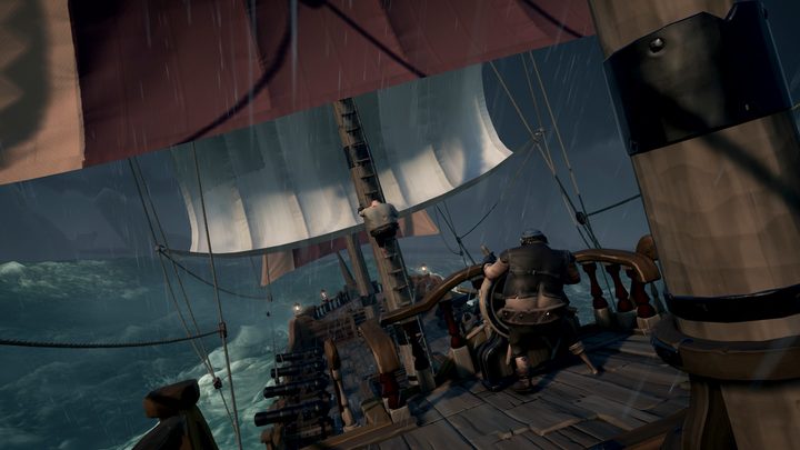 Sea Of Thieves Hands-on Preview | Crewmember piloting ship in storm and swells