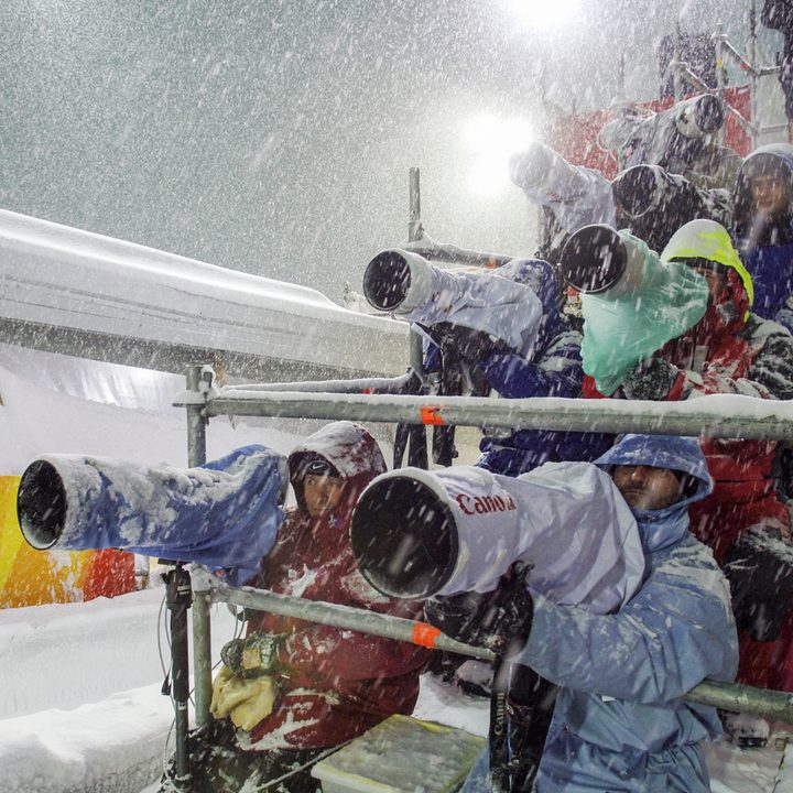 photograph the olympics winter 2018 photographers sit during a heavy snowfal