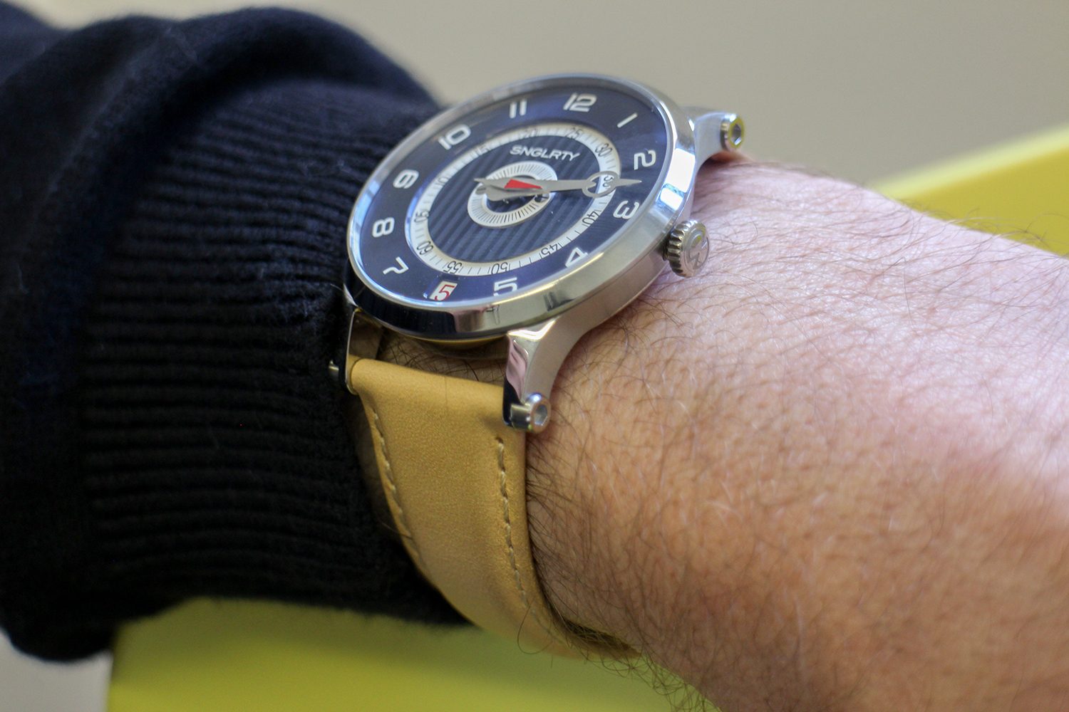 SNGLRTY watch on wrist