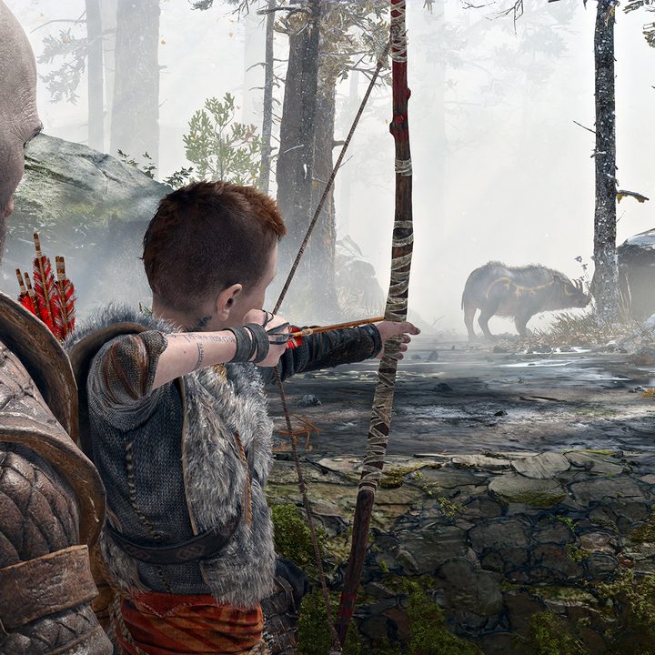 God of War Review | Kratos teaching Atreus to hunt a deer.