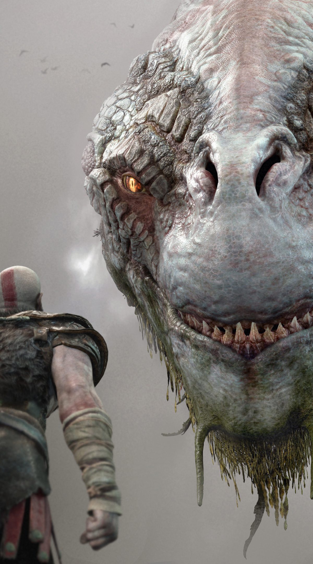 God of War Review | Kratos and Atreus in a boat looking up at a giant hydra-like beast