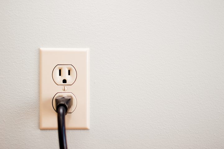 Power outlet on wall.