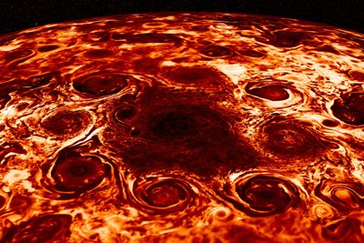 This composite infrared image of Jupiter's north pole shows a central cyclone and eight cyclones encircling it. The image was collected by the Jovian Infrared Auroral Mapper (JIRAM) aboard NASA's Juno mission to Jupiter. For some context, the yellow clouds are about 9 degrees Fahrenheit (-13 degrees Celsius) in brightness temperature, and the dark red are around -181 degrees Fahrenheit (-83 degrees Celsius).