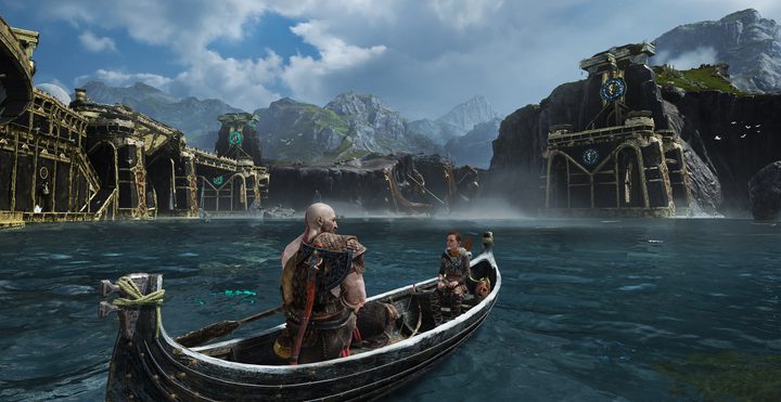 God of War Review | Kratos and Atreus crossing a large body of water near a temple