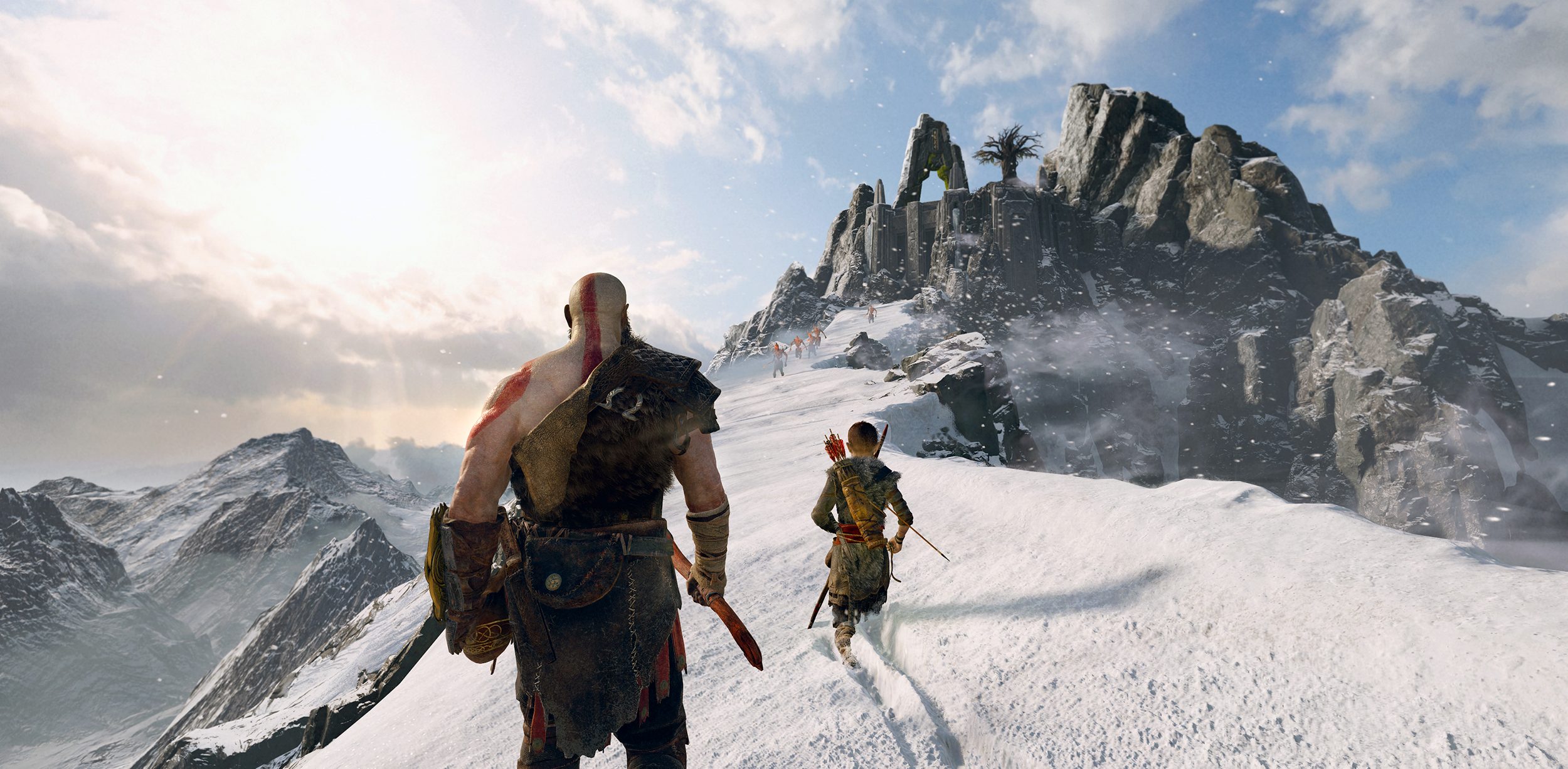 God of War Review | Kratos and Atreus climbing a snowy peak