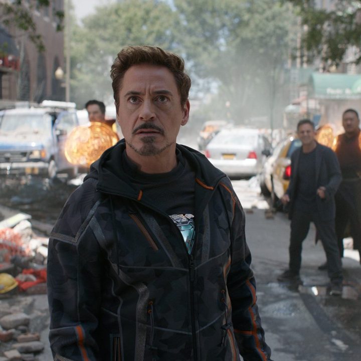 Robert Downey Jr. stands in the middle of the street.