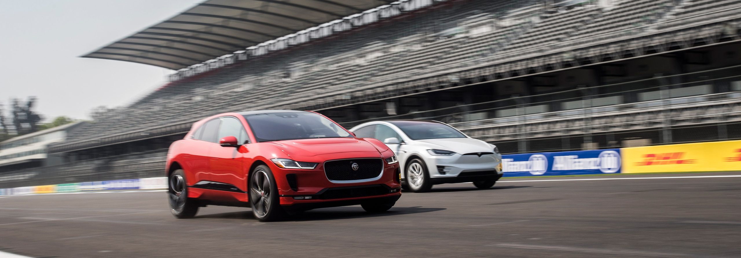 Jaguar I-PACE is pitted against both the Tesla Model X 75D and 100D in a 0mph-60mph-0mph head-to-head challenge.