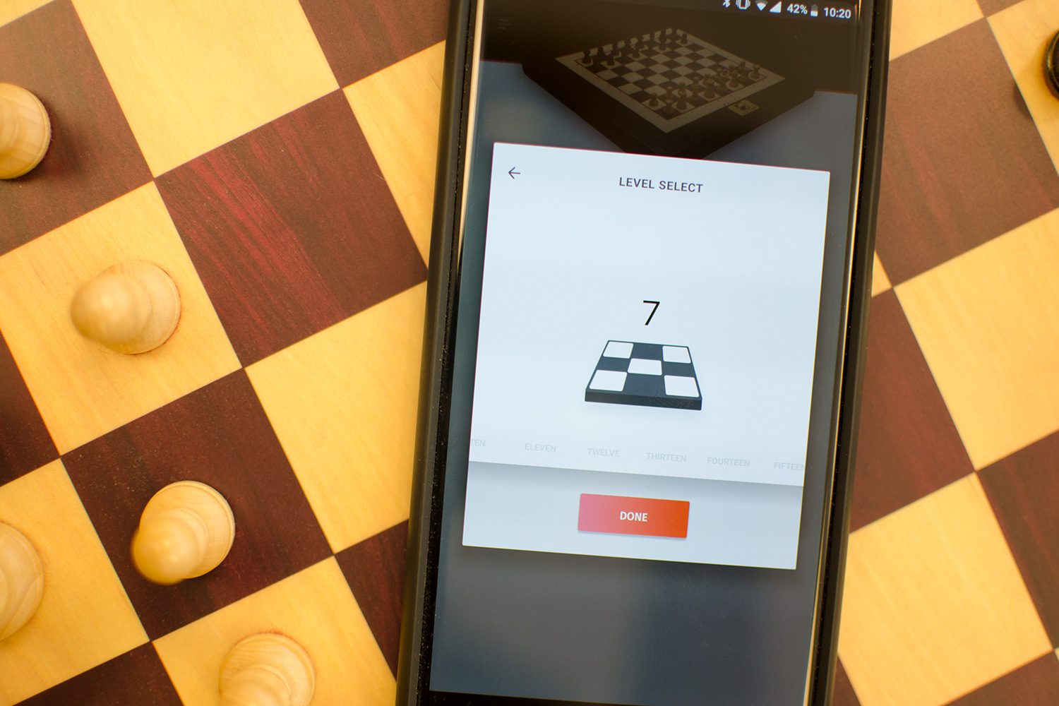 Playing chess on a phone.