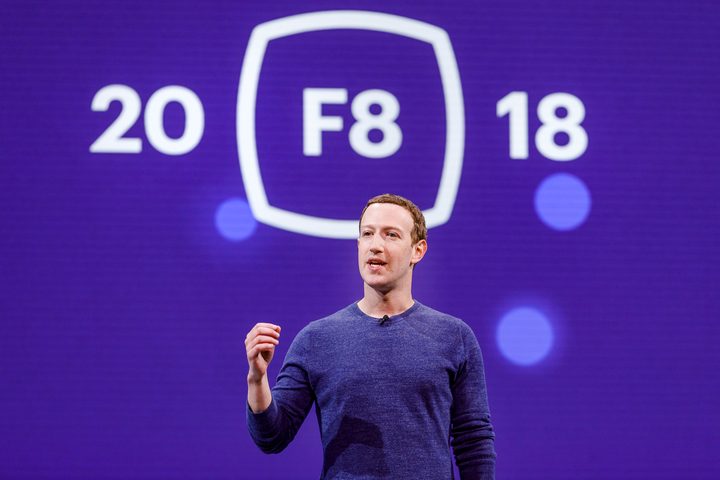 Mark Zuckerberg Keynote Address in front of F8 logo