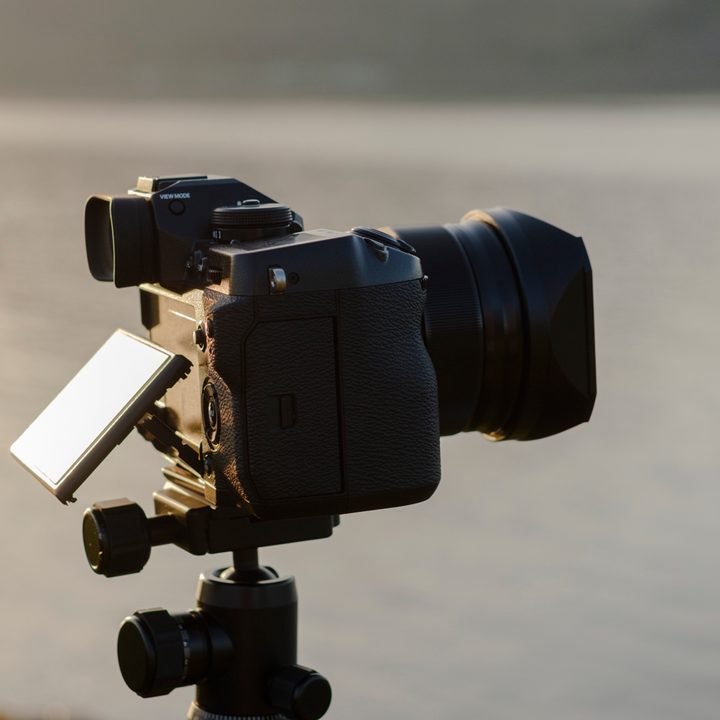 Fujifilm X-H1 review | Right side of camera on a tripod with screen articulated
